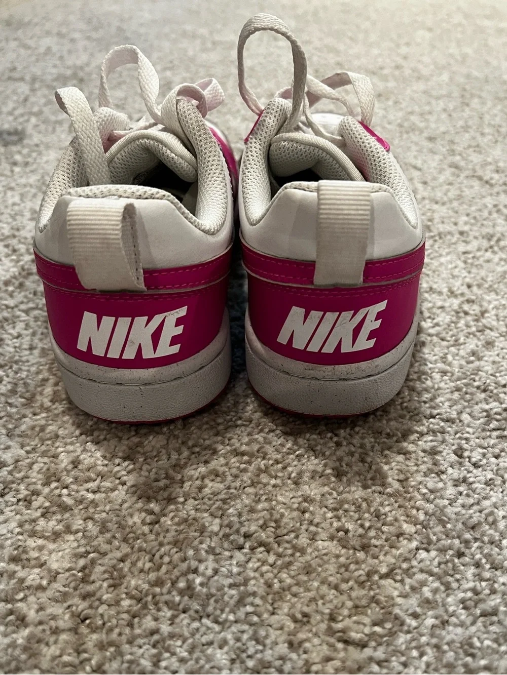 Nike Kids Low-Top Sneakers in White and Hot Pink